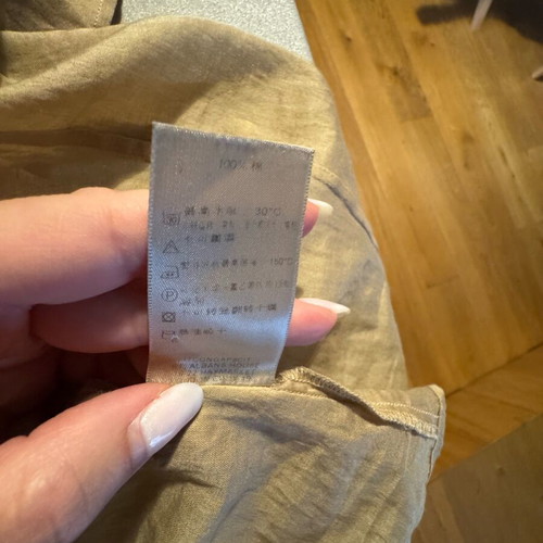 Burberry shirt used in beige satin shade with gold details
