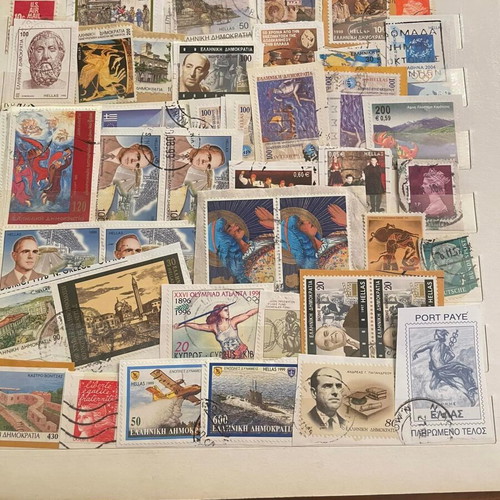 Stamp collection used with album, over 500 pieces