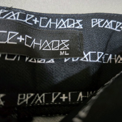 Peace and Chaos set like new, black vest and pants with white stripe