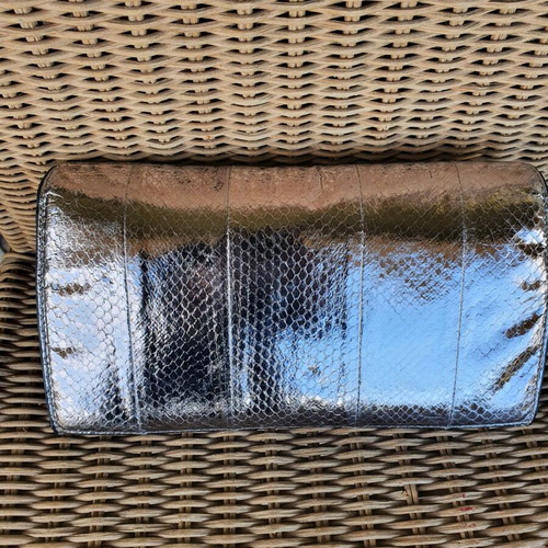 Embossed leather clutch like new, gray and silver