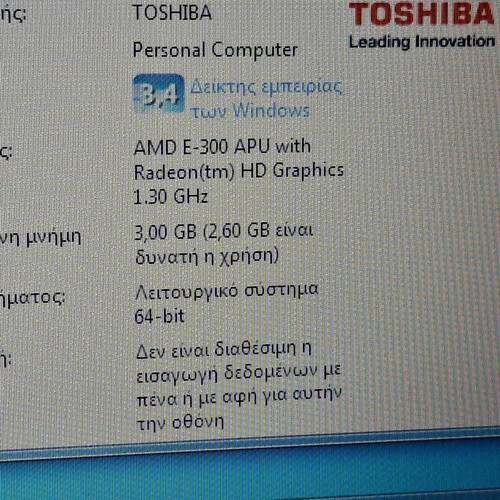 Toshiba laptop used, black, 13-inch, AMD E-Series, 2GB RAM, HDD, Windows
