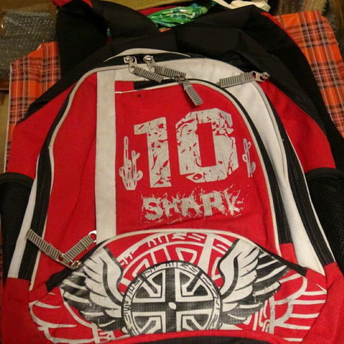 School bag used, red with multiple compartments