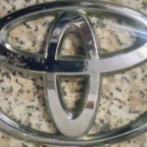 Vintage Toyota car emblem