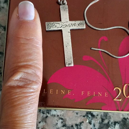 Solid silver cross like new with engraved calligraphic letters