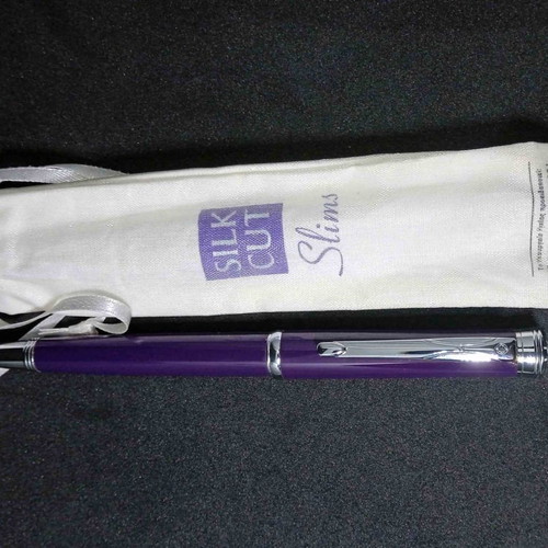 Silk Cut pack used with pen, matches and lighter