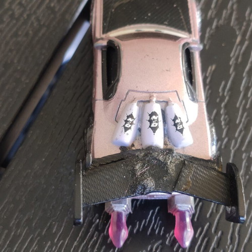 Disney Cars Boost 1:55 scale used with glued spoiler and bent wheels