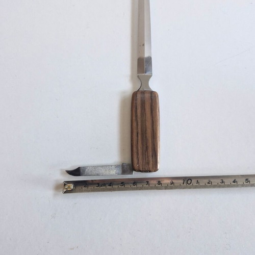 Paper cutter with built-in knife used