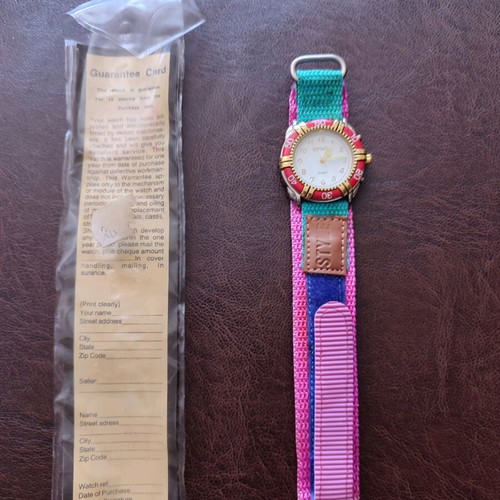 Vintage wristwatch new with metal dial and luminous hands