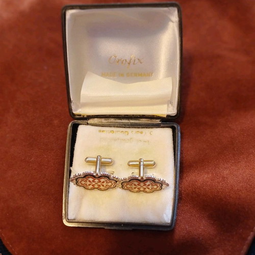 Orofix cufflinks used, vintage, embossed gold on coral background