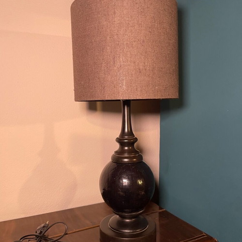 Black table lamp with glass base and gray-black shade