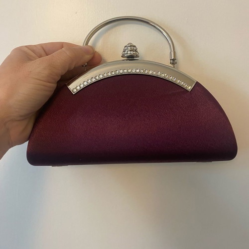 Evening handbag with extra chain for crossbody wear