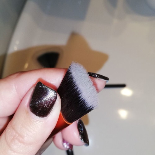 Real Techniques and Avon makeup brush set used