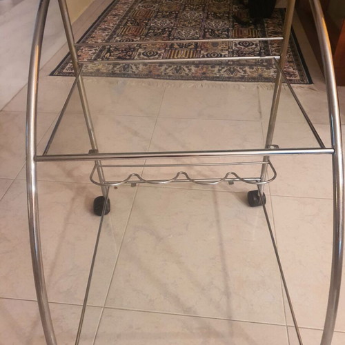 Glass bar table like new with wheels