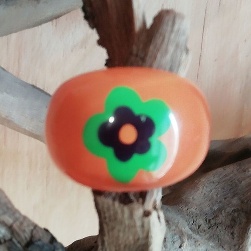 Blown glass ring flower in orange color new
