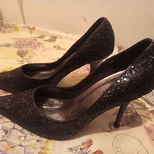 Symbol black heels used with glitter, size 40