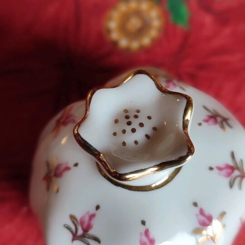 Porcelain pomegranate charm like new with gold leaf detail