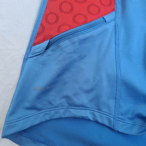 Nike Dri-Fit women's running sports shirt size L with pockets
