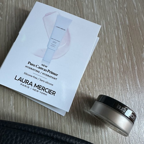 Laura Mercier beauty pouch with translucent powder and hydrating primer new