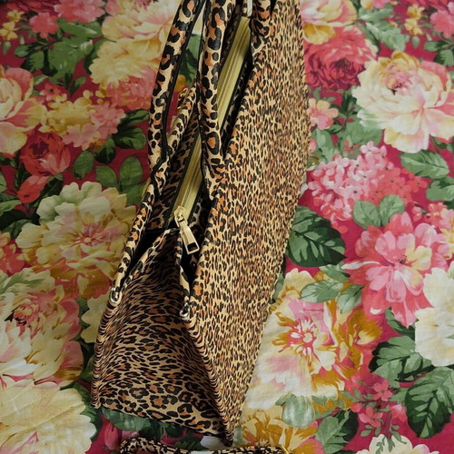 Leopard print women's handbag with strap