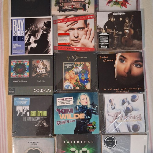 Rock CD collection sealed, indie alternative grunge