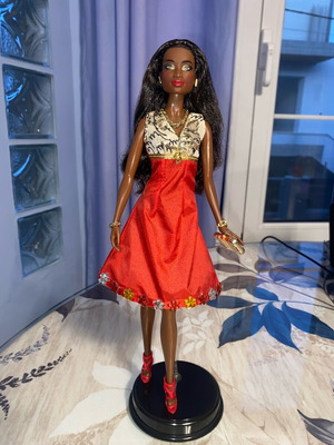 Barbie AA like new with custom clothes and accessories with stand