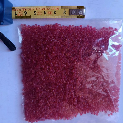 Small beads new, transparent red, 100 grams