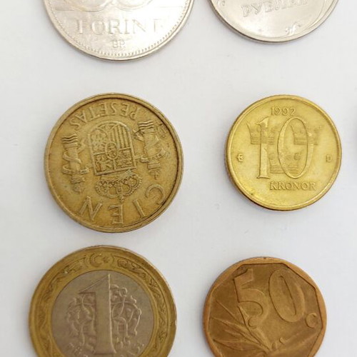Collection of 14 foreign coins like new from various countries