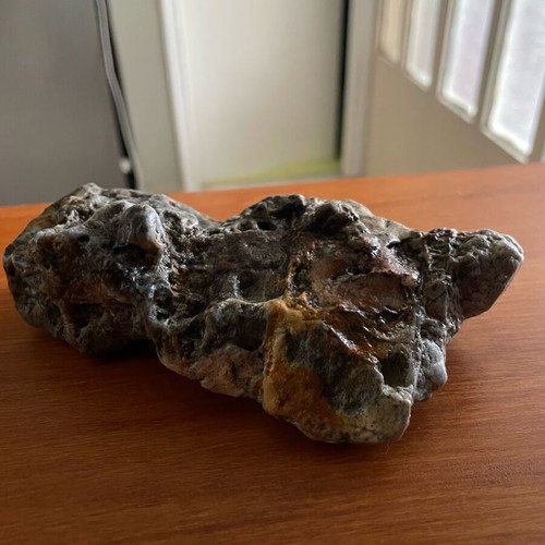 Natural rock with quartz and iron oxides