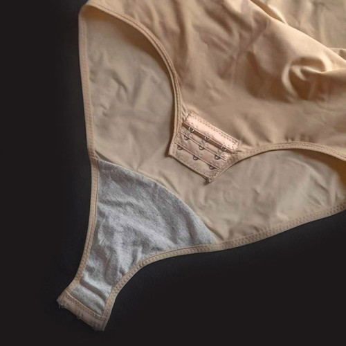 Shaping and Firming Bodysuit used, size Medium, nude color