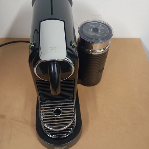Delonghi Nespresso coffee machine with milk frother
