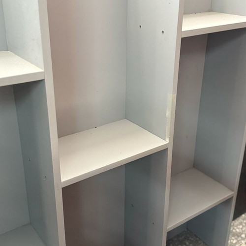 Shelf in gray color like new, modern with three vertical storage spaces