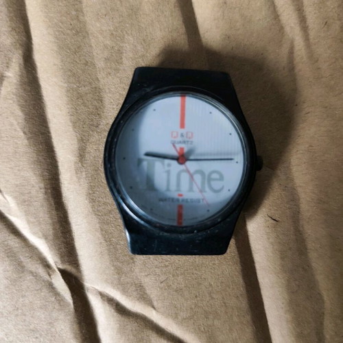 Q&Q watch used without strap, unknown functionality