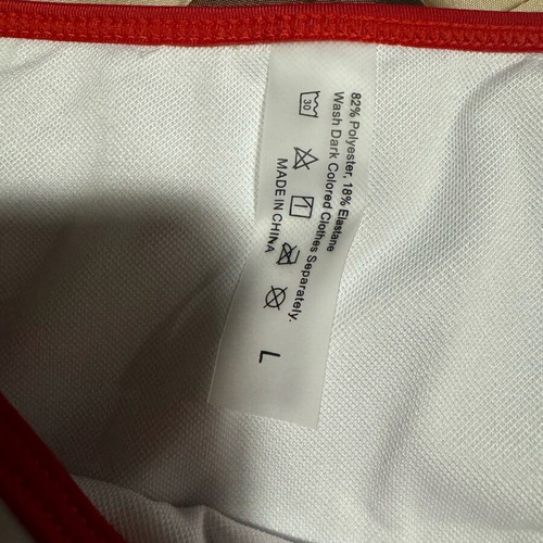 Swimsuit new with playful design, size Large, white and red