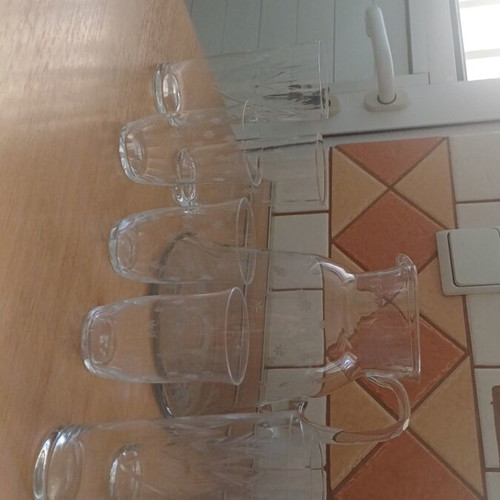 Crystal carafe with 7 glasses like new