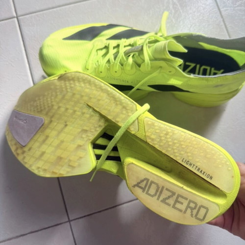 Adidas Adizero Adios Pro 4 running shoes, fluorescent yellow and black
