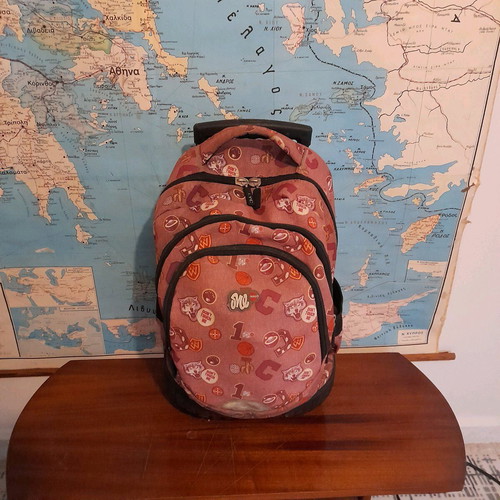School backpack with wheels used