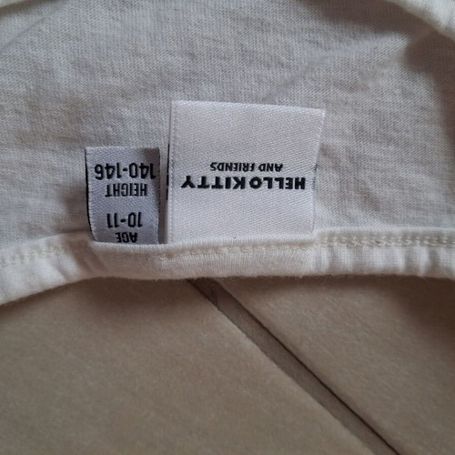 Hello Kitty blouse used for 10-11 years old, white with Kuromi print