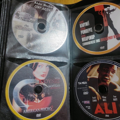 DVD set of 56 with foreign movies like new, in case with sleeves