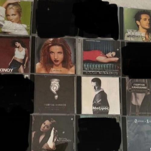 Collection of authentic CDs by Greek and international artists