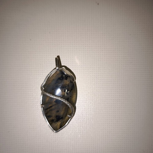 Opal pendant with silver used, snake shape