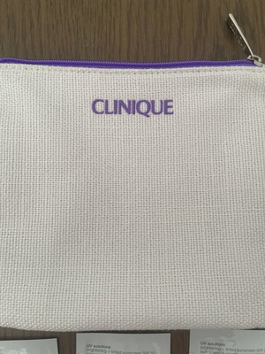 Clinique skincare set new with samples and cosmetic pouch