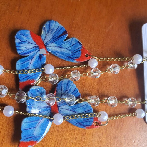 Long earrings new with blue butterfly and gold details