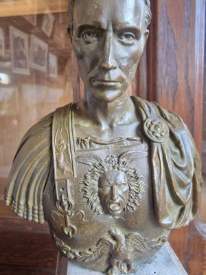Bronze bust of Caesar on polymer marble pedestal