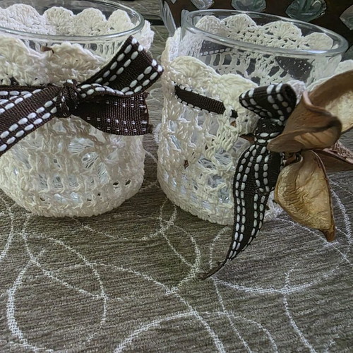 Decorative glasses with crocheted cover like new