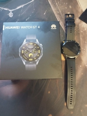 Huawei Watch GT 4 smartwatch with box and charging cable