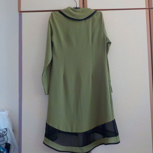 Green dress used with zipper and black transparency