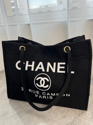 Chanel shoulder bag new, black and white, 35x25cm