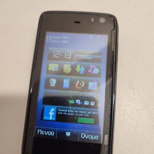 Nokia N-900 used, fully functional but does not charge, with charger