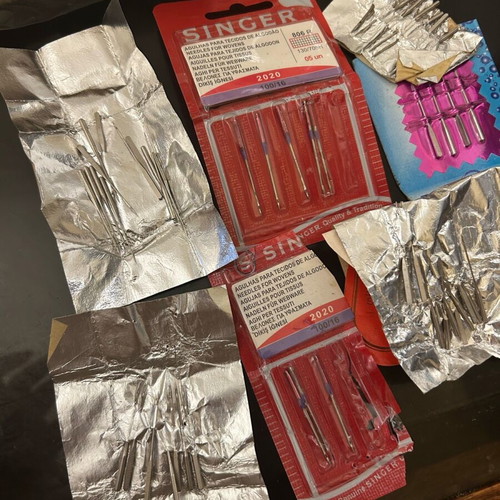 Singer sewing machine needles and knitting needle set, new, about 40 pieces