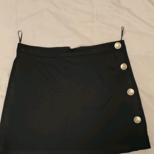 Mini black skirt with gold buttons and crown design, like new, size Large Anel